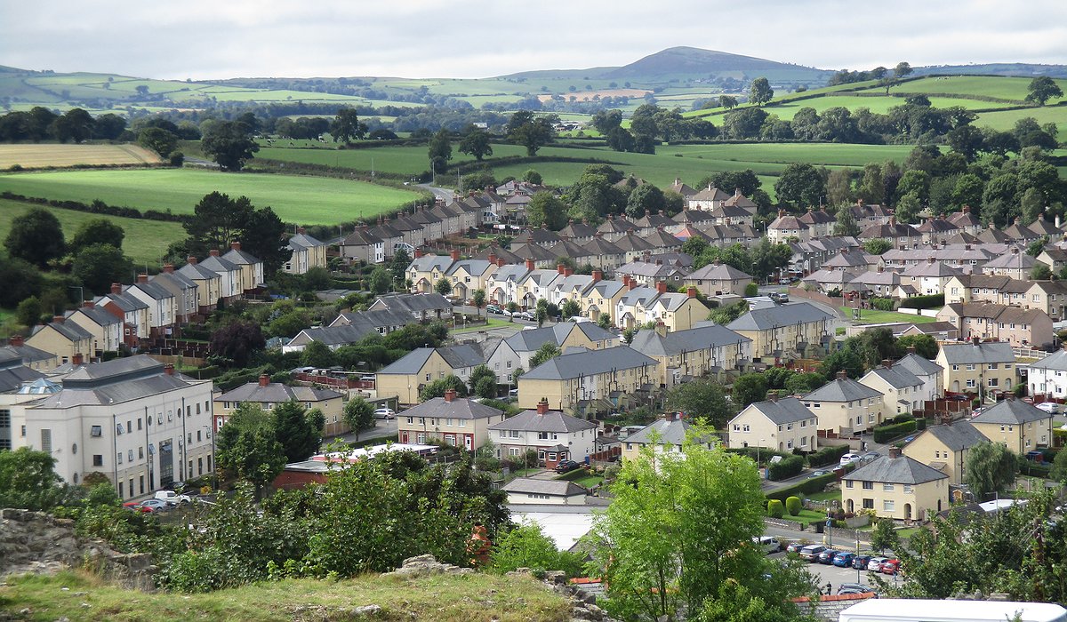Aerial photo of Upper Denbigh showing the renovated houses with new rendering and roofs.